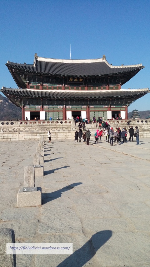 20160121_152947 GeunjeongjeonTheMain Throne Hall- The stone-paved courtyard is lined with two rows of rank stones called pumgyeseoks - indicating where the court officials are to stand according to their ranks.jpg